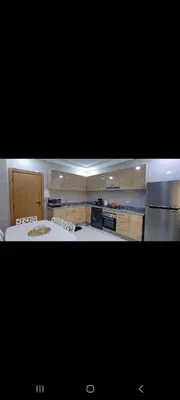 a kitchen with a stoveasteryasteryasteryasteryasteryasteryasteryasteryasteryasteryastery at فيلا فاخرة in Imouzzer Kandar