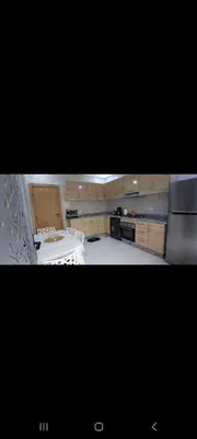 a kitchen with a stove and a counter top at Villa de luxe in Imouzzer Kandar