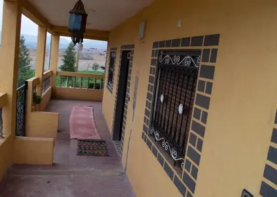 a hallway of a house with a black gate at berber discovery land