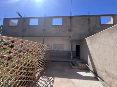 a view of a building with a staircase and windows at Halouli in Tinerhir