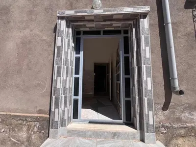 a doorway into a room in a building at Halouli in Tinerhir