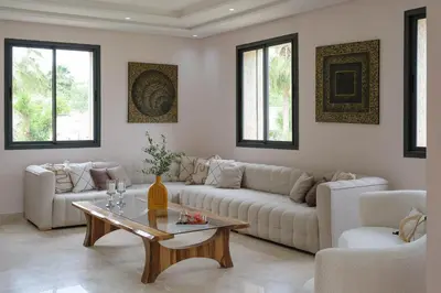 a living room with a couch and a table at Marilah in Marrakech