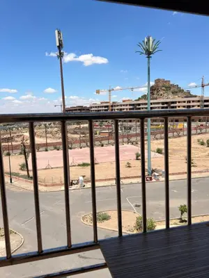 a balcony with a view of a street at Smartkeys in Oulad Akkou