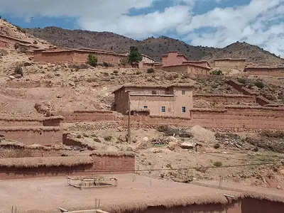 a village on the side of a mountain at Gite d'étape La terre Amazigh in Oulad Akkou
