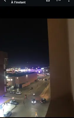 a view of a parking lot at night at Apartment with beautiful view in the center of Marrakech in Oulad Akkou