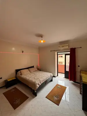 a bedroom with a bed in a room at Belle Chambre Dans Une Villa in Oulad Akkou