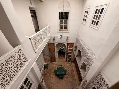 an overhead view of a room with a table in a building at Dar Mohamadia in Fès