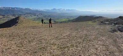 two people standing on the top of a mountain at Villa Zaïtoun in Aït Ourir