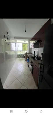 a kitchen with a stove and a counter top at Appartement avec ,1 minte de la plage in Oulad Akkou
