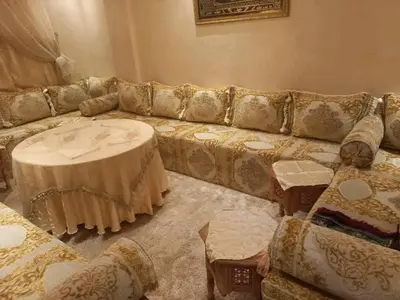 a living room with a couch and a table at العنوان حي المقاومة بلوك دال رقم 389 مكرر ورزازات in Oulad Akkou