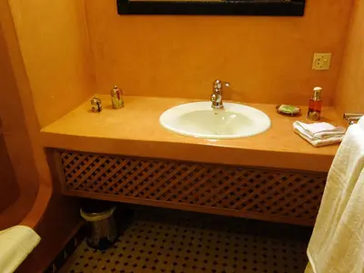 a bathroom counter with a sink in a room at Riad Sabah in Fès