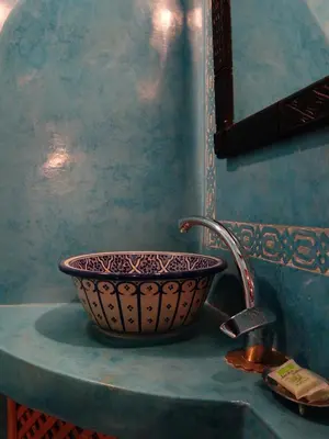 a sink sitting on a counter in a bathroom at Riad Sabah in Fès