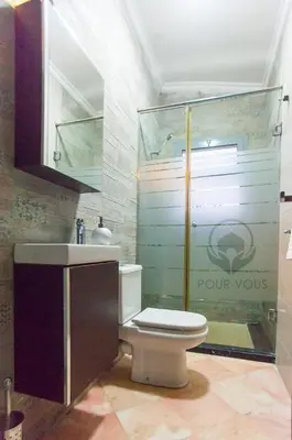 a bathroom with a toilet and a sink at إقامات أهلا قرب مرجان طريق الرباط in Oulad Akkou
