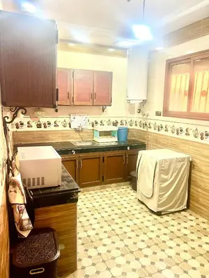 a kitchen with a sink and a counter top at Apparemment 3 chambre in Oulad Akkou