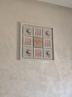 a picture on a white wall with a picture on it at Appartement de luxe in Ifrane