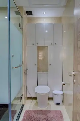 a bathroom with a toilet and a glass shower at Elegance in Oulad Akkou