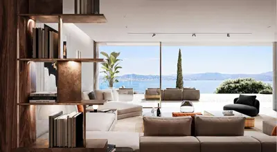 a living room with white furniture and a large window at Villa matudi in Timsernit