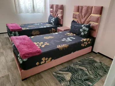 a bedroom with two beds in a room at 2bedroom Apartments in Downtown in Fès