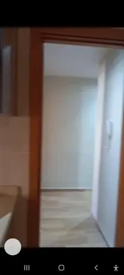 a view of a room through a glass door at Apartamento en Rabat al lado del Mar in Oulad Akkou