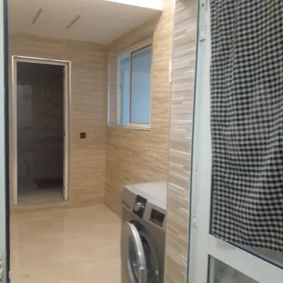 a laundry room with a washer and dryer at ديار البوغاز in Oulad Akkou