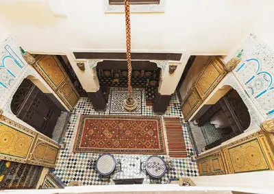 an overhead view of a mosque with a rug on the floor at Le panoramique de Fes in Fès