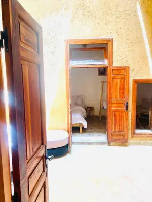 an open door to a bedroom with a bunk bed at Dar cheikh in Fès