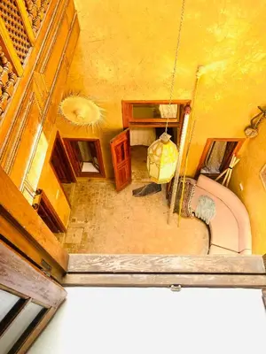 an overhead view of a living room with a couch at Dar cheikh in Fès
