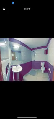 a bathroom with a sink and a toilet at Apparemment bien entretenu in Meknès