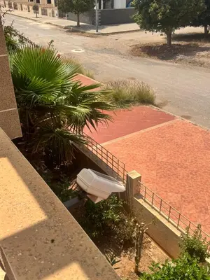 a toilet sitting on the side of a building at Petite villa à cap de l eau in Oulad Akkou