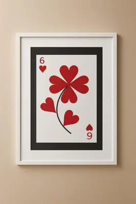 a picture of a playing card with a red flower at Relax Family 06 - Cozy Studio in City Center in Ouarzazate