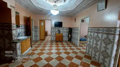a large room with a tiled floor and a ceiling at شقق محمد in Oulad Akkou