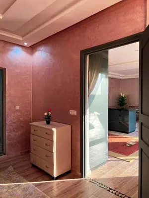 a room with a dresser and a mirror at Ourika Luxury Villa in Ourika