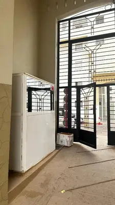 an open door to a building with a garage at Elmaghouss in Oulad Akkou