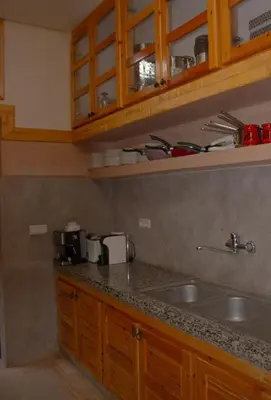 a kitchen with a sink and a counter top at Bab Jbel in Ourika