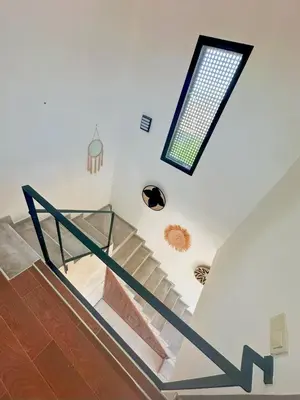 a skylight in the ceiling of a building with stairs at Chic Duo Villas with Pool & Hammam in Ourika