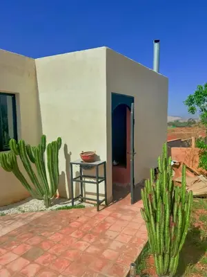 a small house with a table and cactus at Chic Duo Villas with Pool & Hammam in Ourika