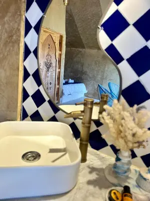 a bathroom with a sink and a mirror on a counter at iMei Lux Camp \u7231\u6885\u91ce\u5962\u8425\u5730 in Lac Yasmins
