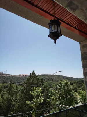 a view from the balcony of a house with a chandelier at Le Refuge de Vittel 2 in Ifrane