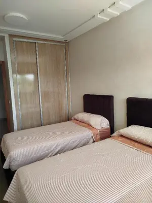 a room with two beds in a room with at Le Refuge de Vittel 2 in Ifrane