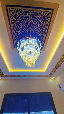 a chandelier hanging from a ceiling in a room at Luxuriöse Wohnung in Fez in Fès