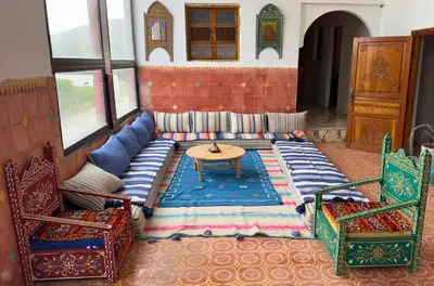 a living room with a couch and two chairs at Villa sans vis à vis Lina in Marrakech