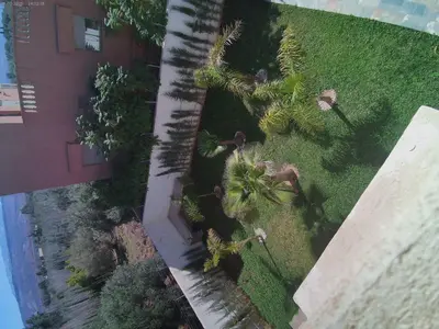 an overhead view of a yard with palm trees at Villa GHMAT in Aghmat
