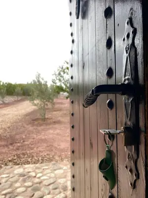 a door with a door knob and a doorhandle at Dar Imane - Magnifique ferme en pleine nature in Ouarzazate