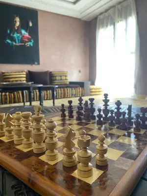 a chess board with chess pieces on top of it at Dar Imane - Magnifique ferme en pleine nature in Ouarzazate