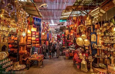 aazaar with people walking through a market with many shops at Beautiful large apartment in Fès