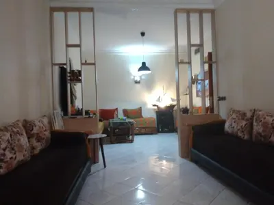 a living room with two couches and a couch at Apartment Rabat Agdal in Oulad Akkou