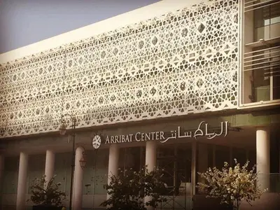 a building with a sign on the side of it at Apartment Rabat Agdal in Oulad Akkou