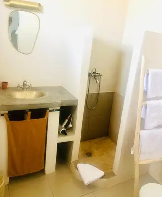 a bathroom with a sink and a shower at Villa 4 chambres avec grande piscine privée in Marrakech