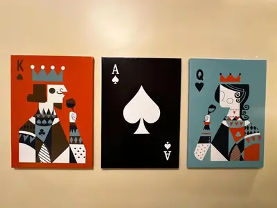 three cards with a king and a queen on a wall at Relax Family 05 - Cozy Entire Apartment in City Center in Ouarzazate