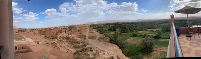 a view of a view of a canyon from a building at Maison d'hôte IGRANE in Tinerhir